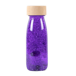 Bouteille sensorielle Float Violette de Petit Boum, vendu par Rêves de fil.